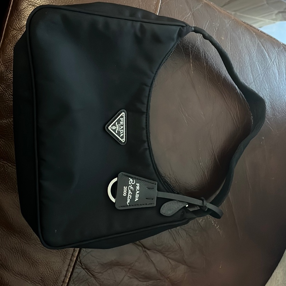 Repooshing. Super cute bag, but person I bought for has it already!
